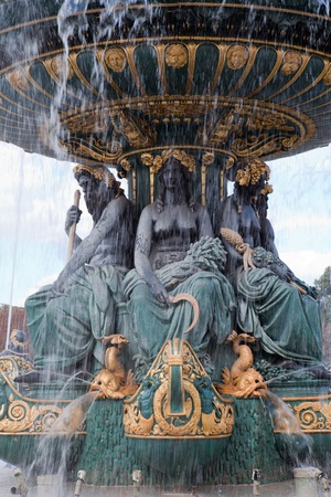 Landmark famous sculptural fountain of River Commerce and Navigation on the Place de la Concorde in Paris France on the cloudy sky backgroundのeditorial素材