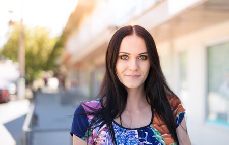 Pretty slim brunette outdoorsの写真素材