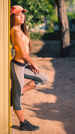 Fit girl on a sports groundの写真素材