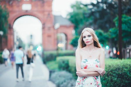 Pretty blonde walking in a parkの写真素材