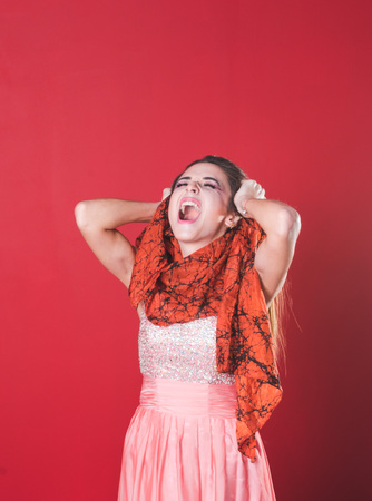 Nice young pretty model in a beautiful dressの写真素材