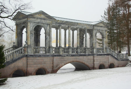Siberian bridge and a thaw in January in the Catherine park in Tsarskoye Seloの写真素材