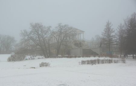 Thaw, fog, Big Pond and Cameron Gallery in Catherine park in Tsarskoye Seloの写真素材