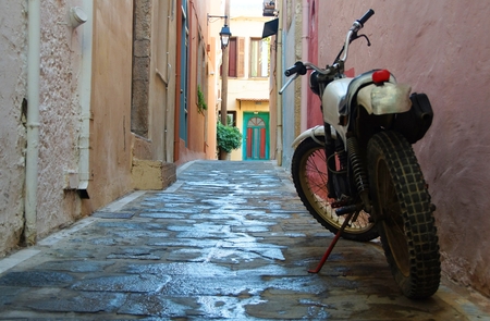 A gentle summer morning on a narrow street in Rethymno, Greeceの写真素材
