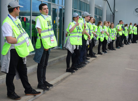 Volunteers, assistants and organizers of the 2018 World Cup match between the teams of Morocco and...