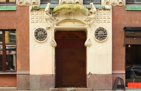 Fragment of the facade of the apartment house and the entrance to the Art Nouveau style on Bolshaya Zelenina Street in St. Petersburgの写真素材