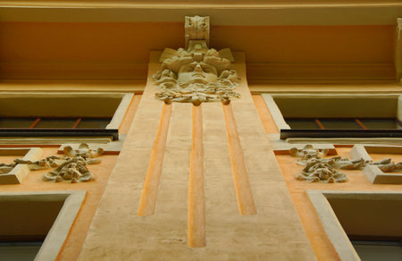 Fragment of the facade of an apartment house in the Art Nouveau style on Lakhtinskaya Street in St....