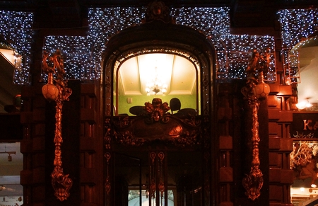 Christmas decoration of the city with electric glowing lights, Nevsky Prospekt and Zinger House in St. Petersburgのeditorial素材