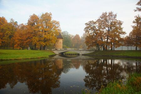 Autumn calm morning on the Slavyanka River in Pavlovsk Park in Pavlovskの写真素材
