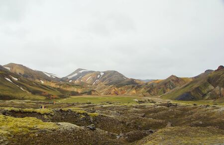 A cool summer Icelandic morning and a new hike in the colored mountains of the Landmannalaugar Natural Parkの写真素材