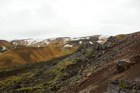Hiking and a cool summer morning among the colored mountains of the Landmannalaugar Natural Parkの写真素材