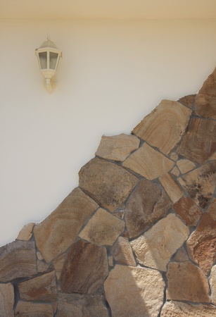 The old wall was built of stoneの写真素材