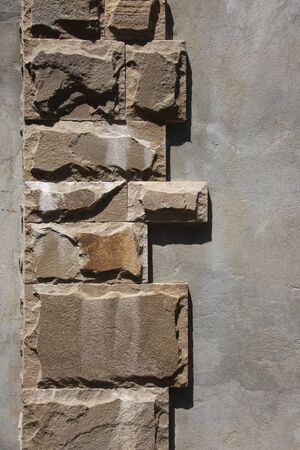 The old wall was built of stoneの写真素材