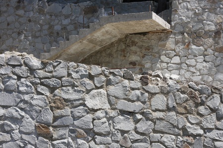 The old wall was built of stoneの写真素材