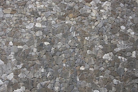 The old wall was built of stoneの写真素材