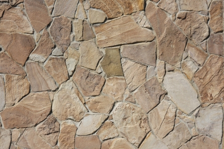 The old wall was built of stoneの写真素材