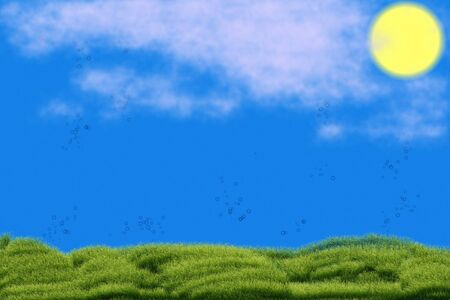 Meadow with green grass and blue sky produces oxygenの写真素材