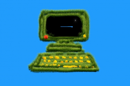 Environmentally friendly kmpyuter of grass and flowersの写真素材