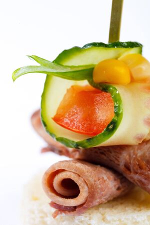 canape , menyu,  ham,mushrooms,greens,meat,egg,cucumber,olive,breadの写真素材