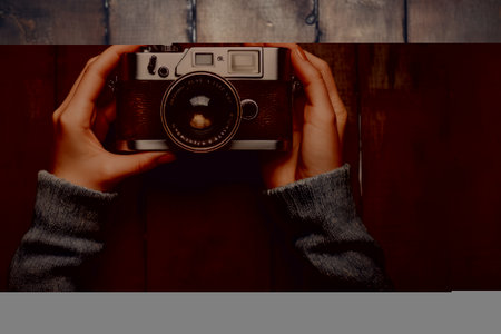 Coffee Shots: Retro Charm Captured through a Lady's Lens on a Rustic Wood Backgroundの素材