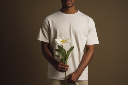 The Blooming Gesture: Man Embracing Nature in White Crew Neck Shirt --ar 3:2の素材