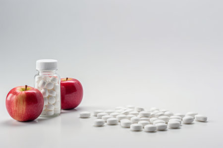 Shedding Pounds Effortlessly: A Brilliant Blister with Bright Juicy Apple and White Vitamin Tabletsの素材