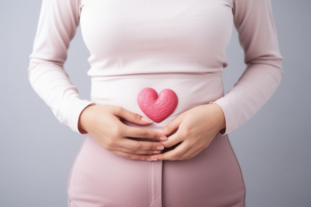 Gut Health Care: Womans Heartfelt Gesture Soothes Stomach Acheの素材