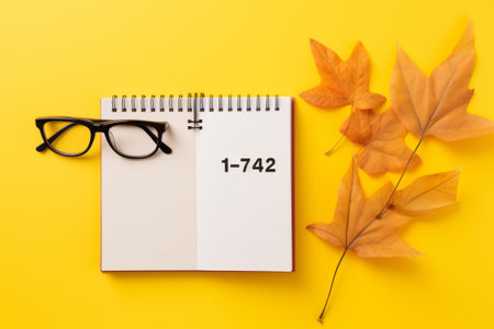 Embracing Fall: Captivating Image of September 15th with Office Supplies on a Vibrant Yellow Backgroの素材