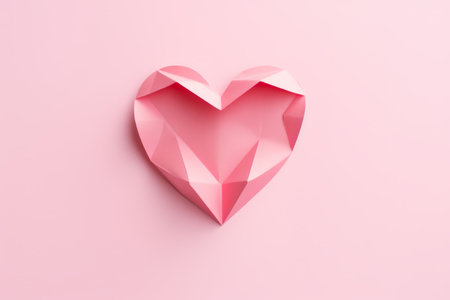Delicate Elegance: Paper Heart on a Light Pink Canvas --ar 3:2の素材