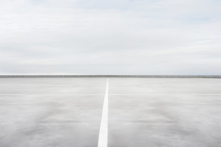 Vast Parking Oasis: A Sea of Gray Asphalt with Crisp White Stripesの素材