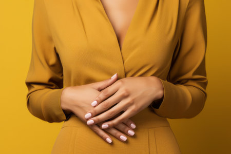 Elegantly Adorned: Stunning Brown Nail Design on a Vibrant Yellow Canvasの素材