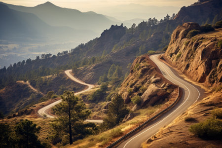 Majestic Landscapes: Capturing the Serenity of a Winding Road near Mountain Rock Landscapeの素材