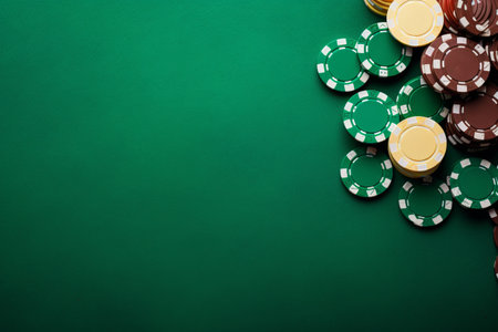 Gambling Bliss: Poker Chips on a Green Table - A Captivating Top-View Snapshotの素材