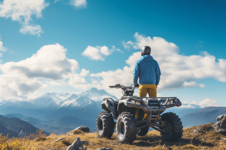 Conquering the Wild: Thrill-seeking Quad Biker Tackles Mountains and Explores Off-Road Terrainの素材