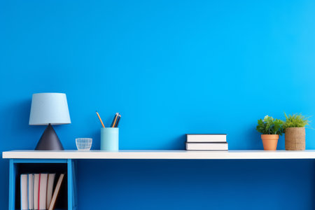 Unleashing Creativity: A Vibrant Office Desk with Supplies and a Striking Blue Wallの素材
