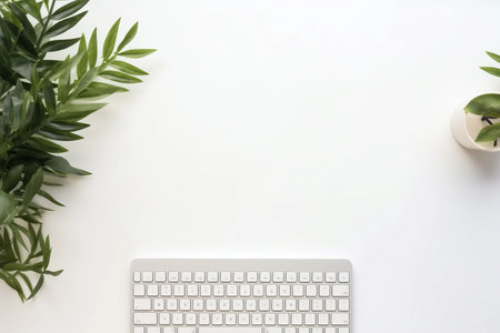 Modern Hipster Office Desk: A Minimalist Flat Lay Banner with Tropical Botanical Accentsの素材