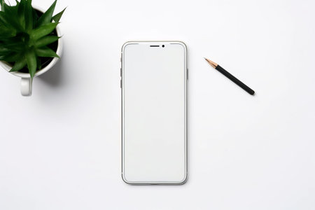 Featuring a Minimalistic Flat Lay: White Table with Mobile Phone, Coffee Cup, Notepad, and Keyboard, Providing Ample Space for Creativity --AR 3:2の素材