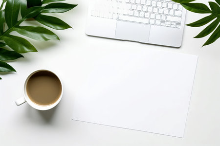 Efficient Workspace: A Contemporary White Office Desk with Tech Essentials and Refreshing Brew, Offering Endless Creative Possibilities (Top View)の素材