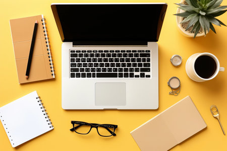 Yellow Bliss: A Productive Office Desk with Laptop and Supplies in Flat Lay Viewの素材