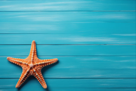 Mesmerizing Starfish: A Captivating Encounter on a Blue Wooden Tableの素材