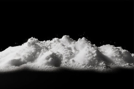 Unblemished Brilliance: Capturing the Unforgettable Charm of Small Snowdrifts on a Black Canvasの素材