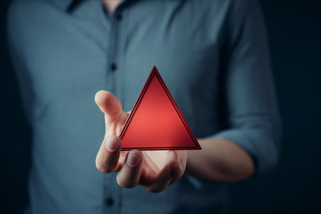 Gripping the Risk: Hand Signals Maintenance Alert with Red Triangle Warningの素材