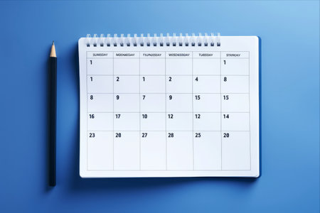 Organizing Your Busy Schedule: Blue Background with White Calendar Page Set for Important Appointments - AR 3:2の素材