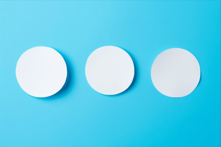 Office Paper Stickers Set Against a Vibrant Blue Background: A Creative Mock-up in 3:2 Aspect Ratioの素材