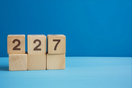 Capturing the Essence of Summer: A Vibrant June 27th Wooden Color Calendar Composition on Blue Backgroundの素材