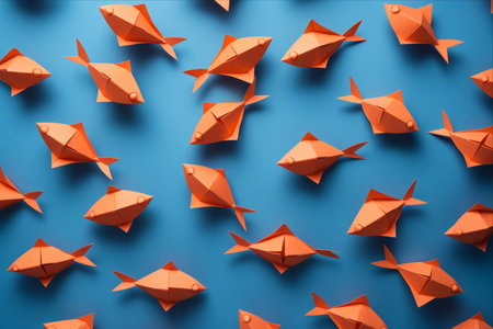 Vibrant Orange Origami Fish: Captivating Patterns Amidst a Soothing Blue Background AR 3:2の素材
