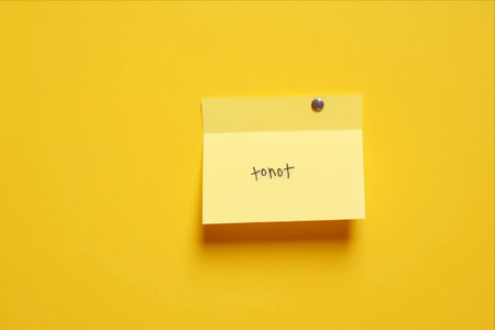 Essential Message: Attention-grabbing Paper Note, 'Important' Tag on Vibrant Yellow Background, Ample Room for Text -- Aspect Ratio 3:2の素材