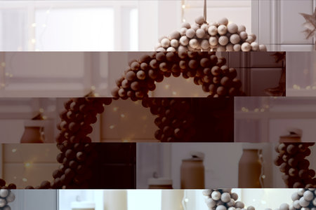 Scandinavian Nordic Concept: Earthy Beige Modern Kitchen adorned with Christmas Wooden Beads Wreath on Light Wallの素材