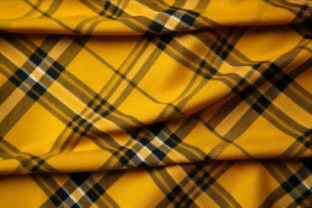 Yellow checkered fabric as a background, closeup of photoの素材