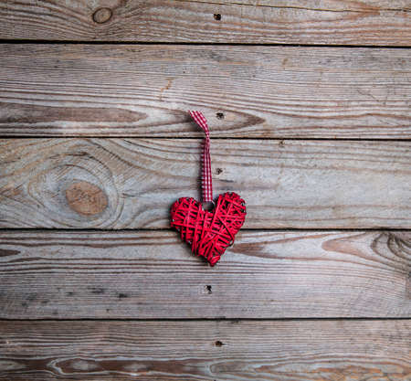 heart on a wooden background. Red, Valentine's Day, Day of the enamoredの写真素材